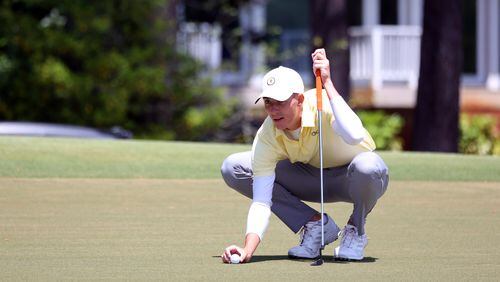 Georgia Tech senior Ross Steelman lines up the title-winning putt at the ACC men's golf championship at the Country Club of North Carolina in Pinehurst, North Carolina April 24, 2023. Georgia Tech defeated Wake Forest 3-2 in match play, with Steelman clinching his match at the 16th hole.(Andy Mead/Georgia Tech Athletics)