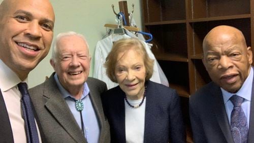 U.S. Sen. Cory Booker poses with Jimmy and Rosalynn Carter and Rep. John Lewis on his Instagram account.