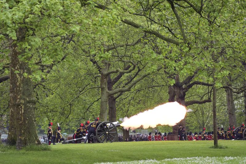 The King's Troop Royal Horse Artillery fire a 41 Gun Royal Salute in Green Park to mark the first anniversary of the Coronation of Britain's King Charles III and Queen Camilla, in London, Monday May 6, 2024. (Yui Mok/PA via AP)