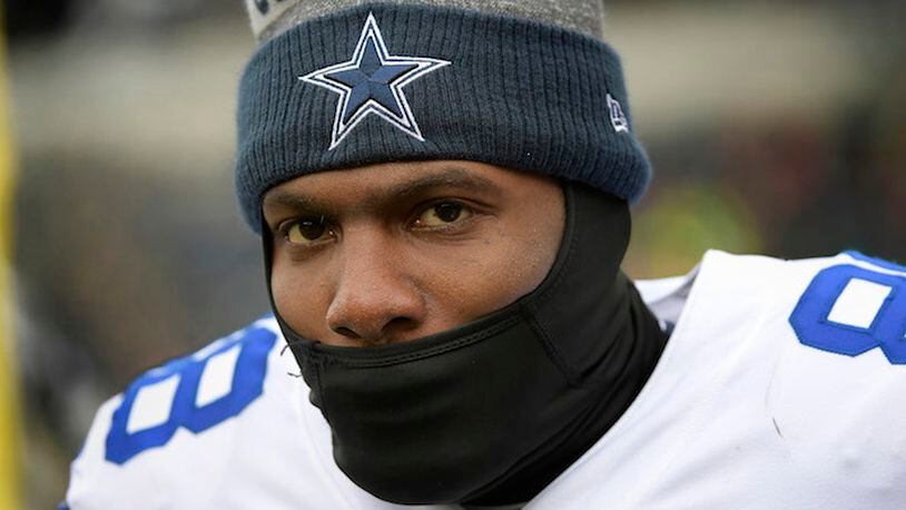 Dallas Cowboys wide receiver Dez Bryant tries to stay warm on the sidelines against the Philadelphia Eagles at Lincoln Financial Field in Philadelphia on Sunday, Dec. 31, 2017. (Max Faulkner/Fort Worth Star-Telegram/TNS)