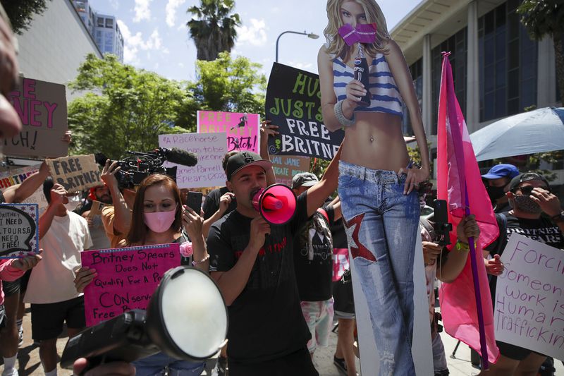 Supporters of Britney Spears rally as a hearing on the Britney Spears conservatorship case takes place at Stanley Mosk Courthouse in Los Angeles on June 23, 2021. (Irfan Khan/Los Angeles Times/TNS)