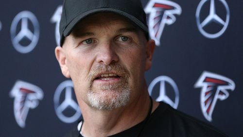 Falcons coach Dan Quinn takes questions from the media at his news conference during rookie minicamp on Friday, May 12, 2017, in Flowery Branch. Curtis Compton/ccompton@ajc.com
