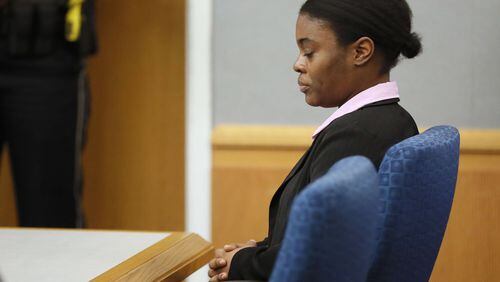 Tiffany Moss showed little reaction to being convicted of murder for intentionally starving her 10-year-old stepdaughter Emani to death in the fall of 2013. She was sentenced to death. Bob Andres / bandres@ajc.com