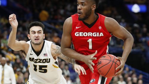 Georgia's Yante Maten (1) heads to the basket past Missouri's Jordan Geist (15) during the second half in an NCAA college basketball game at the Southeastern Conference tournament Thursday, March 8, 2018, in St. Louis. Georgia won 62-60. (AP Photo/Jeff Roberson)