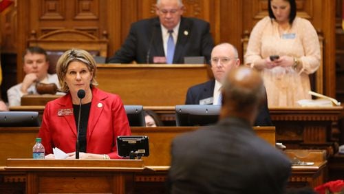 April 2, 2015 - Atlanta - Speaker Pro Tem Jan Jones ,, taking a question from Rep. Calvin Smyre, D - Columbus, presents HB 213, a transportation related bill to allow the counties that fund MARTA to increase the tax that supports it. Democrats were promised passage of the bill in order to secure a vote on the big transportation bill. With the legislative session ending Thursday, GOP leaders OK'd a slew of tax increases, gave the state more control over local public schools and shot down 'religious liberty' efforts -- all while working hand-in-glove with Democrats to beat back fringe Republicans who've otherwise split the majority caucus. BOB ANDRES / BANDRES@AJC.COM