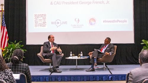 World Bank Group President David Malpass, left, participates in a fireside chat with Clark Atlanta University President George French, Jr., right, at the Robert W. Woodruff Library at Clark Atlanta on Friday, May 5, 2023.  (Jenni Girtman for The Atlanta Journal-Constitution)