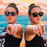 Bella Ferary (L) and her twin sister Angel are senior stalwarts for the school's nationally ranked beach volleyball team. (Photo by Daniel Wilson/Georgia State Athletics)