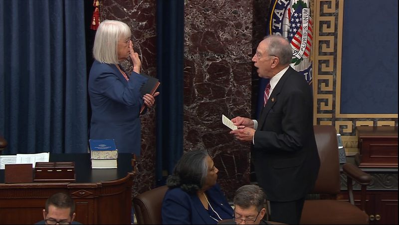 In this image from video from Senate Television, Sen. Patty Murray, D-Wash., is sworn in to preside by Sen. Chuck Grassley, R-Iowa, during the impeachment trial of Homeland Security Secretary Alejandro Mayorkas on the Senate floor at the U.S. Capitol, Wednesday, April 17, 2024, in Washington. (Senate Television via AP)