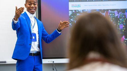 Samuel Johnson, a 2009 Alum, speaks to a French IV class at Holy Innocents' Episcopal School in Sandy Springs. After graduating from Mercer University, he founded an orphanage in West Africa. PHIL SKINNER FOR THE ATLANTA JOURNAL-CONSTITUTION.