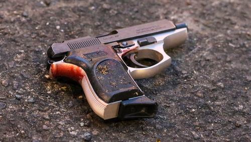 Gun at a different Atlanta shooting scene. (John Spink / jspink@ajc.com / AJC file photo)