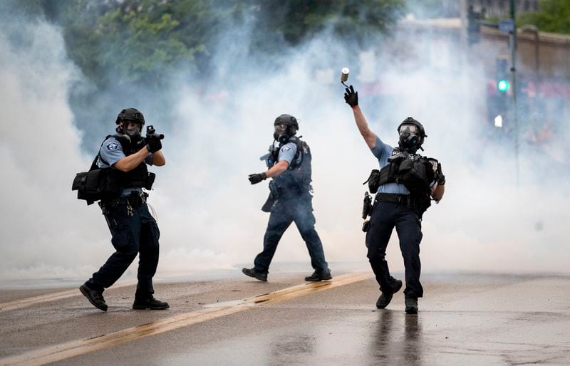 MINNEAPOLIS, MN,- MAY 26: Police clashed with protesters at the Minneapolis 3rd Police Precinct. People gathered at Chicago Ave. and East 38th Street during a rally in Minneapolis on Tuesday, May 26, 2020. Federal authorities are investigating a white Minneapolis police officer for possible civil rights violations, after a video surface showing him kneeling on a handcuffed African-American man's neck and ignoring the man's protests that he couldn't breathe. The man later died. An attorney for the man's family identified him as George Floyd.