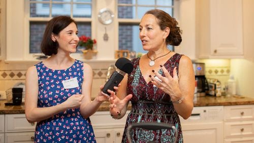 Julia Levy (left) spent part of the evening interviewing the evening’s hostess, Leslie Kalick Wolfe. Tradition Kitchens plans a future podcast series featuring an episode on each pop-up class. CONTRIBUTED BY EUGENE BUCHKO