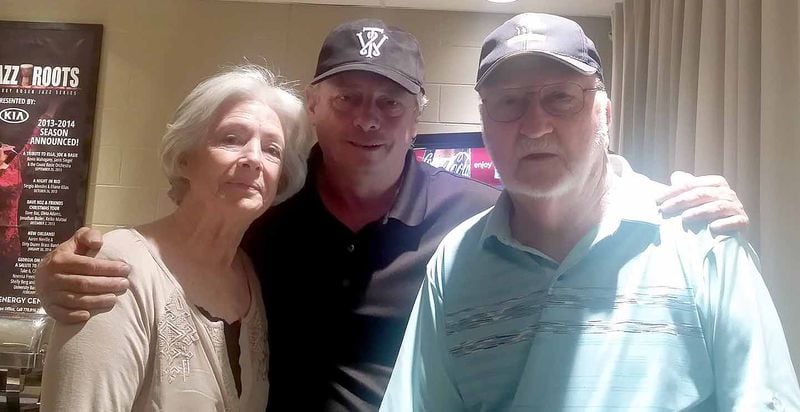 James McAuliffe, shown with his mother and step-father, Diane and Harley Vaughn, had a chance to catch up at a concert earlier this year in Cobb County.  (Photo: Special to The AJC)