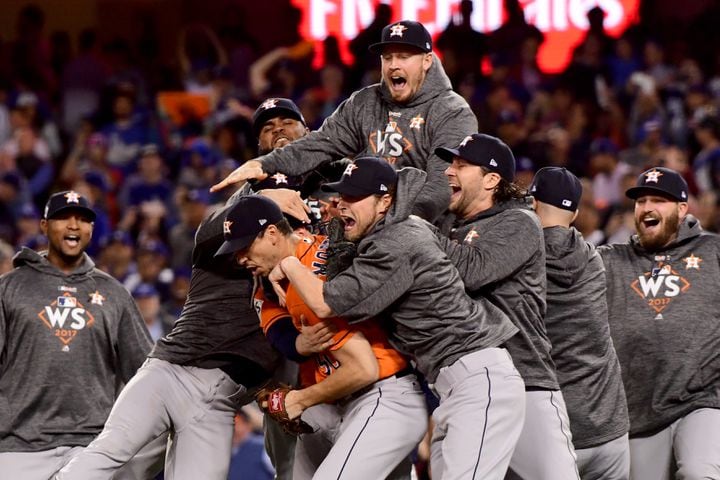 Photos: Ex-Braves McCann, Morton celebrate as Astros win World Series