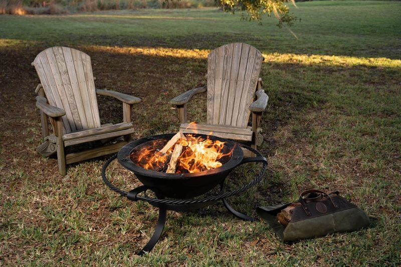 Cozy up around a fire pit for and keep warm with space to prop everyone’s feet.