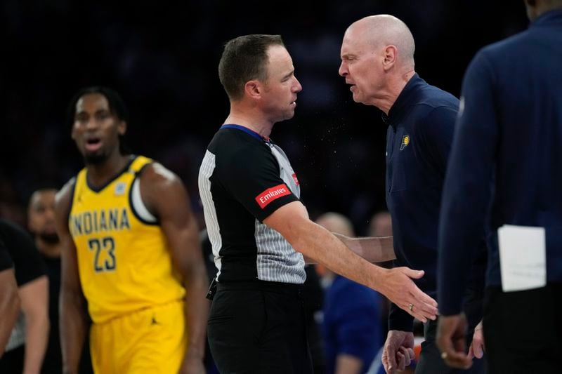 Indiana Pacers head coach Rick Carlisle, right, argues with a referee during the second half of Game 2 of the team's NBA basketball second-round playoff series against the New York Knicks, Wednesday, May 8, 2024, in New York. The Knicks won 130-121. (AP Photo/Frank Franklin II)