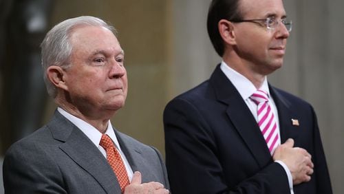 Attorney General Jeff Sessions (L) and Deputy Attorney General Rod Rosenstein (R) attend the Religious Liberty Summit at the Department of Justice July 30, 2018 in Washington, D.C.