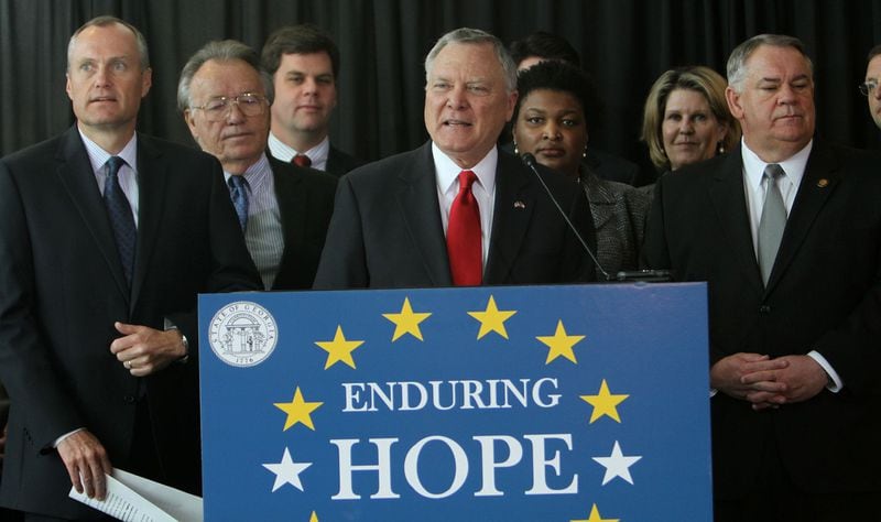 Fearing that lottery’s reserves used to support Georgia's HOPE scholarships were just a few years away from depletion, then-Gov. Nathan Deal led a bipartisan coalition to revamp the program in 2011, tightening eligibility requirements and reducing award payouts. AJC FILE PHOTO.