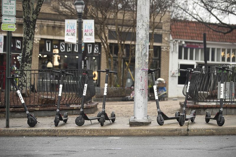  Bird Scooters sit parked on the sidewalk of Euclid Avenue NE in Atlanta’s Little Five Points community, Friday, January 4, 2019. (ALYSSA POINTER/ALYSSA.POINTER@AJC.COM)