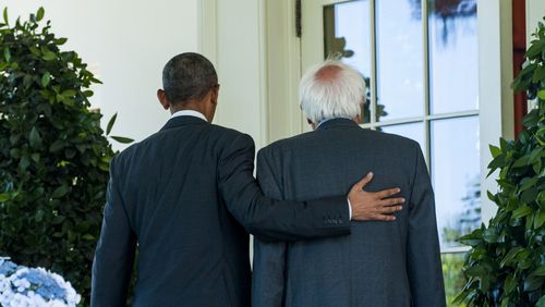 President Barack Obama and U.S. Sen. Bernie Sanders walk along the colonnade adjacent to the Rose Garden at the White House on Thursday. Sanders was meeting with Obama in the Oval Office to discuss the campaign. Pete Marovich/Abaca Press/TNS