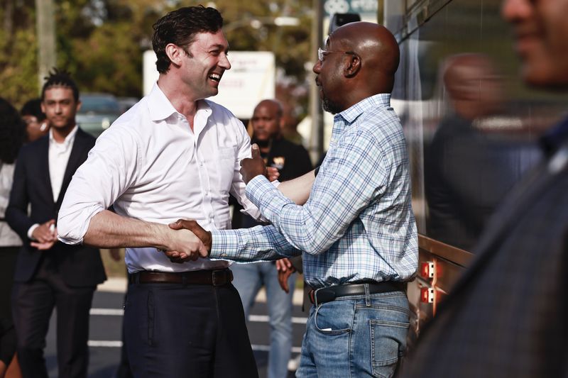 U.S. Sens. Jon Ossoff, left, and Raphael Warnock have both stressed the work they do across the aisle with Republicans. (Natrice Miller/natrice.miller@ajc.com)  