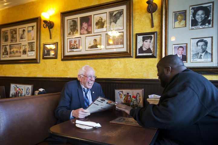 Democratic presidential candidate Sen. Bernie Sanders, I-Vt. left, sits with rapper Killer Mike at the Busy Bee Cafe on Monday in Atlanta. Killer Mike introduced Sanders at a campaign event at the Fox Theatre later in the evening. AP/David Goldman