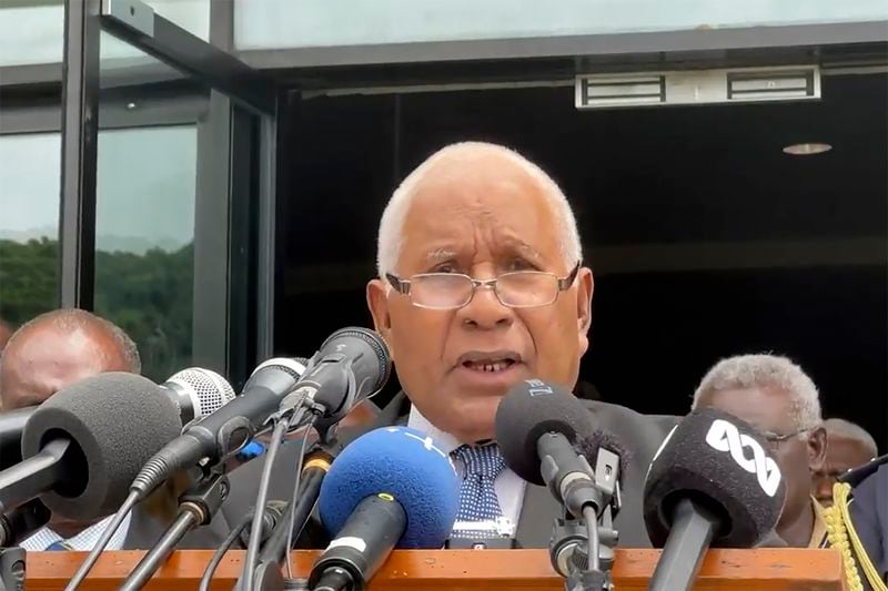 In this image from a video, Solomon Islands Governor General David Vunagi announces election results outside the parliament in Honiara, Solomon Islands Thursday, May 2, 2024. Solomon Islands lawmakers on Thursday chose former Foreign Minister Jeremiah Manele as the new prime minister of the South Pacific island nation that has grown closer to China in recent years. (Australian Broadcasting Corporation via AP)