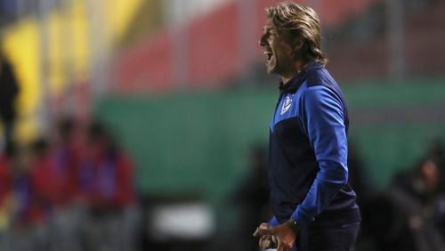 Gabriel Heinze, coach of Argentina's Velez Sarsfield, gives instructions to his players during a Copa Sudamericana soccer match against Ecuador's Aucas Tuesday, Feb. 18, 2020, at the Gonzalo Pozo Ripalda stadium in Quito, Ecuador. (Dolores Ochoa/AP)