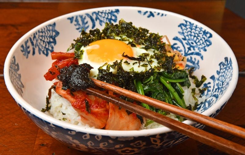 Todd Dae Kulper relies on store-bought marinade and banchan to whip up tasty Korean bibimbap with minimal effort. Chris Hunt for The Atlanta Journal-Constitution 