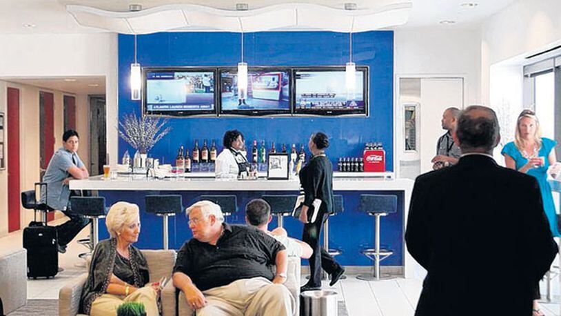 Travelers get in some downtime in the renovated Delta Sky Club in Concourse B. This is what customers can expect for the Concourse A Sky Club, except the A17 one will be larger.