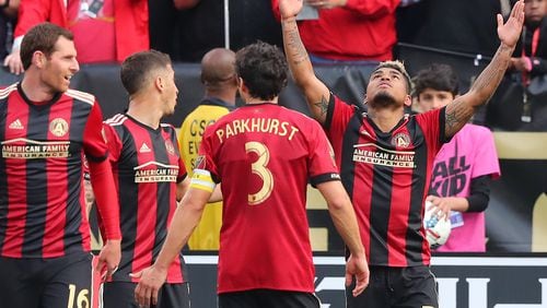 March 18, 2017, Atlanta: Atlanta United forward Josef Martinez (right) celebrates his second of two goals against the Chicago Fire for a 4-0 victory in their MLS game on Saturday, March 18, 2017, in Atlanta.    Curtis Compton/ccompton@ajc.com