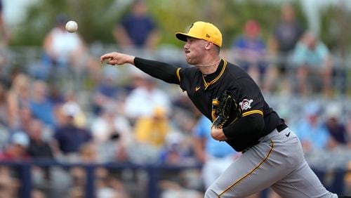 FILE - Pittsburgh Pirates pitcher Paul Skenes throws in the fourth inning of a spring training baseball game against the Tampa Bay Rays in Port Charlotte, Fla., March 4, 2024. Skenes, who has a 0.99 ERA in seven Triple-A starts, will make his major league debut for the Pirates on Saturday, May 11, when they face the Cubs, a person with direct knowledge of the decision told The Associated Press on Wednesday. (AP Photo/Gerald Herbert, File)