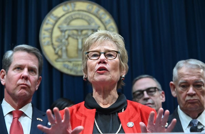 Dr. Kathleen Toomey, commissioner of the Georgia Department of Public Health, speaks during a press conference on March 12, 2020, about the state's COVID-19 efforts. On the left is Gov. Brian Kemp and on the far right is House Speaker David Ralston. (Hyosub Shin / Hyosub.Shin@ajc.com)