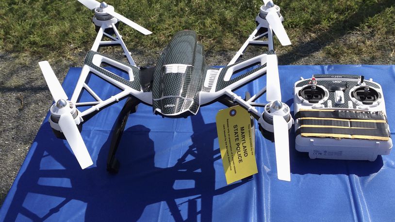 This photo shows a Yuneec Typhoon drone and controller in Jessup, Md. Maryland State Police and prison officials say two men planned to use the drone to smuggle drugs, tobacco and pornography videos into the maximum-security Western Correctional Institution near Cumberland, Md. (AP Photo/David Dishneau, File)