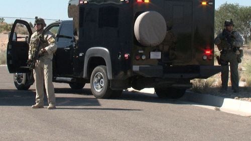 Security officers protect big rigs hauling nuclear weapons. (Office of Secure Transportation)