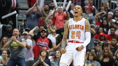 Atlanta Hawks Kent Bazemore and fans celebrate as he hits a three against the Washington Wizards on the way to a 116-98 victory in game 3 of a first-round NBA basketball playoff series on Saturday, April 22, 2017, in Atlanta.  Curtis Compton/ccompton@ajc.com
