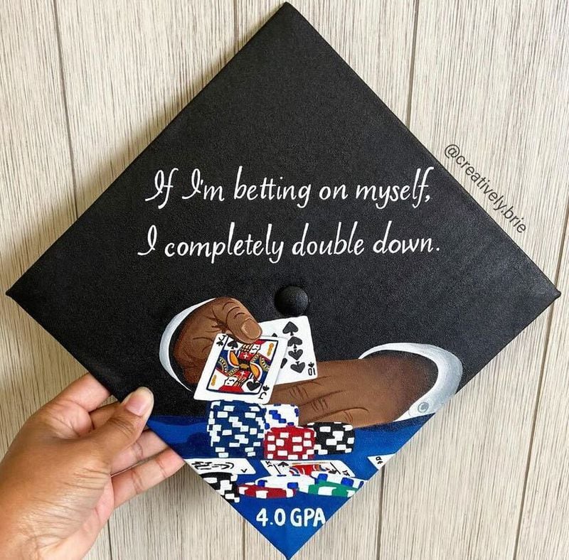 A custom painted graduation cap by Bria Bowen of Creatively Brie. (Courtesy of Creatively Brie)