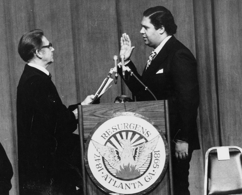 Judge Luther Alverson administers the oath of office to Atlanta Mayor Maynard Jackson on Jan. 7, 1974. As mayor, Jackson demanded black-owned firms be included in lucrative city contracting. That access to the halls of power helped shape Atlanta's black middle class — and an unbroken string of black mayors. AJC archives photo/Charles Pugh