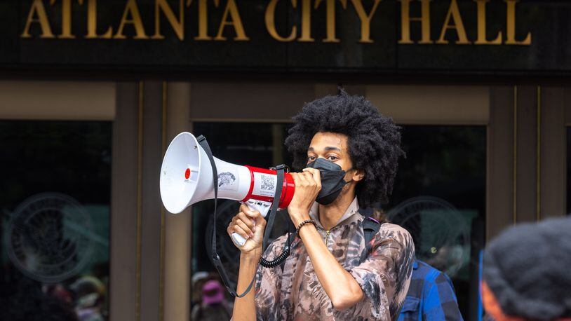 Protesters gather outside Atlanta City Hall ahead of the final vote to approve legislation the funds the training center on Monday, June 5, 2023. (Arvin Temkar / arvin.temkar@ajc.com)