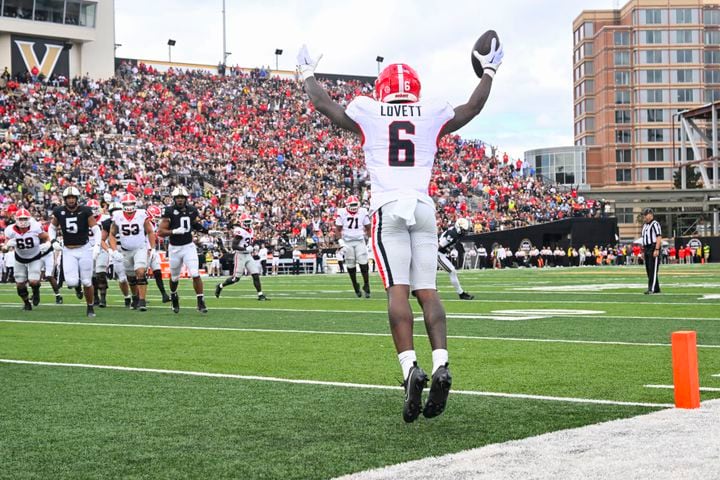 Georgia wide receiver Dominic Lovett (6) celebrates a touchdown catch against Vanderbilt during the second half of an NCAA football game, Saturday, Oct. 14, 2023, in Nashville, Tenn. (Special to the AJC/John Amis)