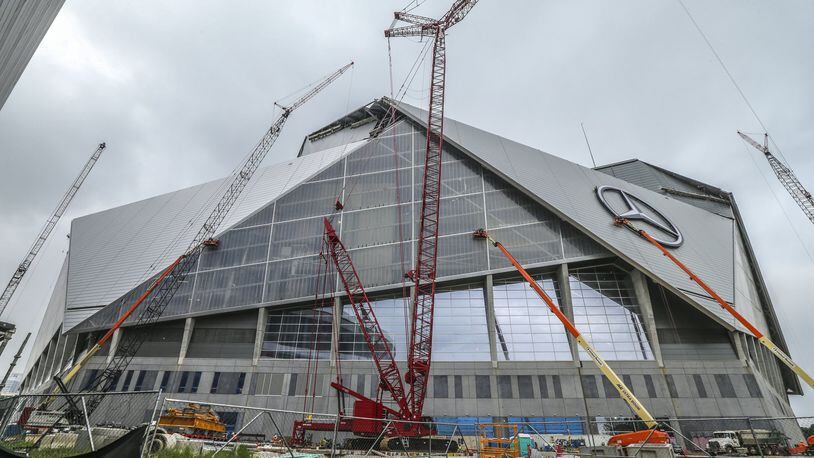 Construction continues on Mercedes-Benz Stadium. (Photo by JOHN SPINK /JSPINK@AJC.COM on April 19)