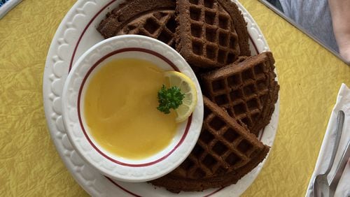 At Java Jive on Ponce de Leon Avenue in Atlanta, gingerbread waffles served with lemon curd on the side are a weekend brunch exclusive. CONTRIBUTED BY OLIVIA KING