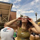 Chattanooga State student Aiyana Loher looks at the partial solar eclipse from the Chattanooga State Community College campus Monday. (Photo Courtesy of Shannon Coan)
