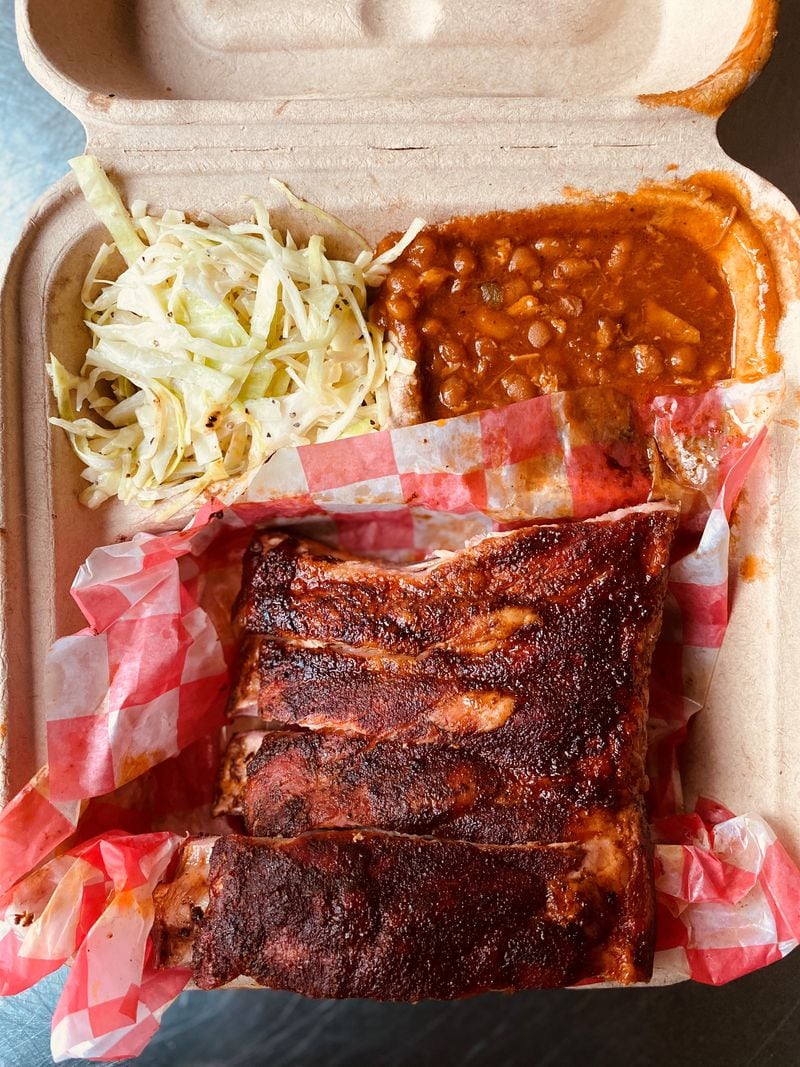 This rib plate from BBQ Cafe in Decatur comes with slaw and baked beans. Wendell Brock for The AJC