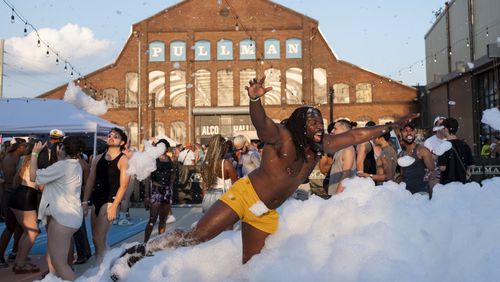 David Folkes pretends to jump into the foam at the Chaka Khan Hacienda party at Pullman Yards on Sunday, Sept. 10, 2023. Photo by Ben Gray 
ben@bengray.com