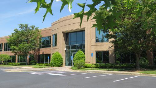 Peachtree Corners will purchase this two-story building at 310 Technology Parkway to serve as city hall. Courtesy City of Peachtree Corners
