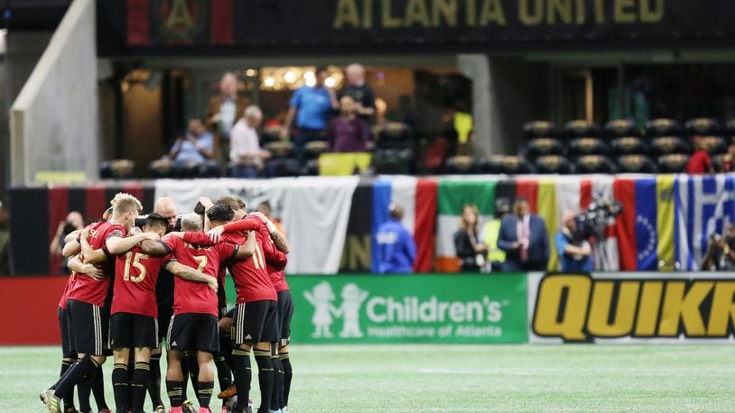 October 26, 2017.   Atlanta United players gather in the field  during the first round of the MLS playoff match at Mercedes-Benz stadium.