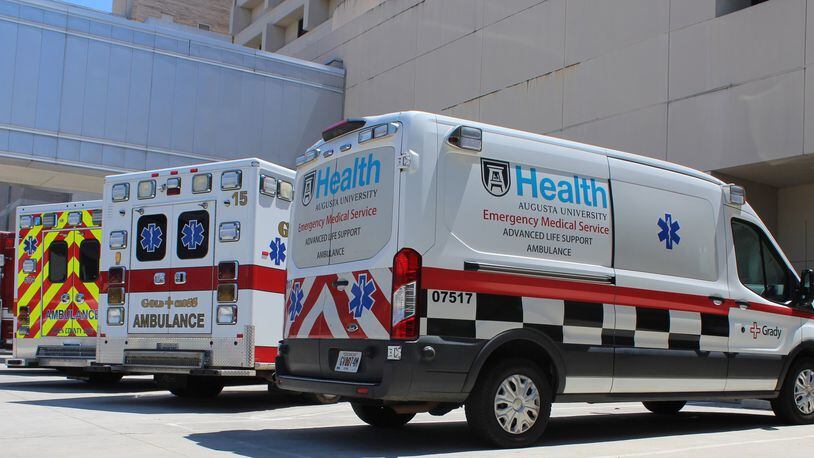 A Grady EMS van waits to transport non-emergency patients at the emergency room of the Augusta University of Medical Center.