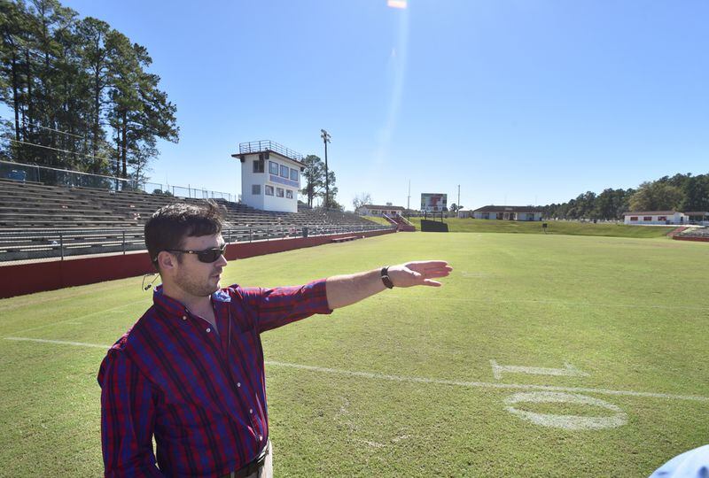 Will Wright visits Booster Stadium, where his younger brother and best friend, Staff Sgt. Dustin Wright, wowed fans on the gridiron. This is also where hundreds of people from across the nation turned out to see his funeral. His casket was brought to the 50-yard line. “For me, I have peace because I know my brother was born for that moment,” Will said. “And if you gave him a choice to be here today and told him it would cost somebody else’s life, there is no way he would change that.” HYOSUB SHIN / HSHIN@AJC.COM