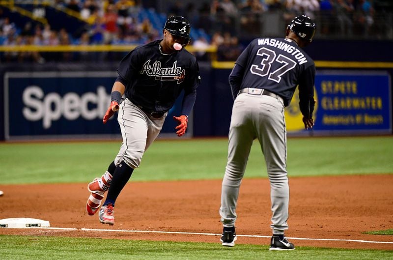 Ronald Acuna runs rounds third base on his third-inning home run Tuesday against the Rays. (Photo by Julio Aguilar/Getty Images)